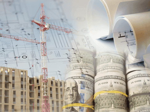 Jerab pred rozestavenym bytovym domem a srolovane bankovky